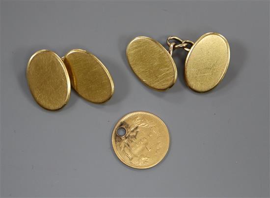 A pair of 18ct gold oval cufflinks and a USA 1856 gold one dollar piece (Liberty head type 2, damaged)